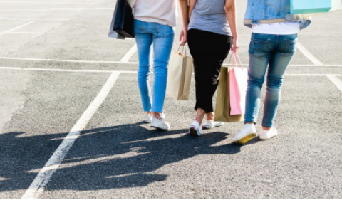 Chinese women walking together outside a mall